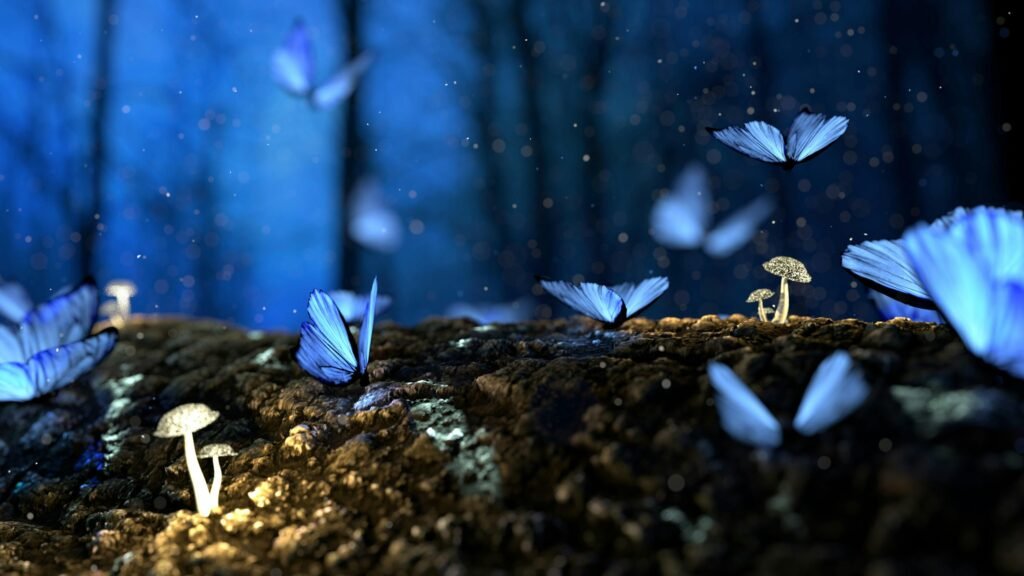 pexels photo 326055 326055 Magical scene of blue butterflies fluttering amidst glowing mushrooms in a dark forest.